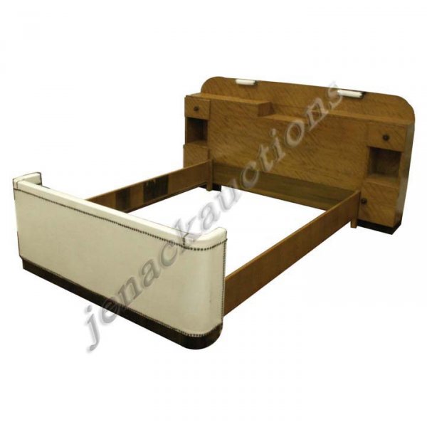 GILBERT ROHDE FULL SIZE BED IN FLAMED BIRCH: GILBERT ROHDE FULL SIZE BED IN FLAMED BIRCH/ROSEWOOD HEADBOARD & VINYL COVERED FOOTBOARD, BY HERMAN MILLER. HEIGHT 40 1/2"; LENGTH 79" (MINOR SCRATCHES/VENEER LOSS)