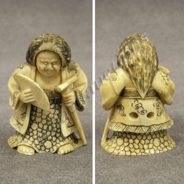 JAPANESE CARVED IVORY NETSUKE WITH REVOLVING FACE