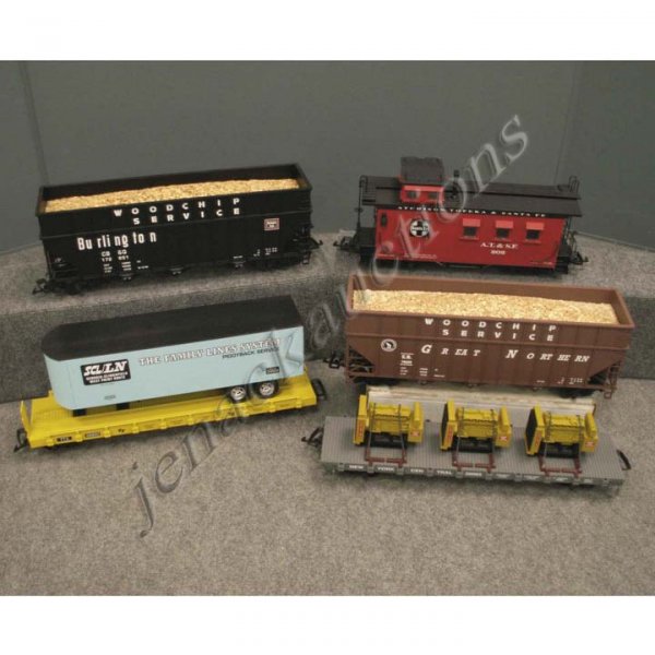 LOT (5) CHARLES RO G-SCALE CARS: LOT (5) CHARLES RO G-SCALE CARS INCLUDING PIGGY BACK FLAT CAR, TTX; (2) WOOD CHIP CARS, GREAT NORTHERN & BURLINGTON; WOOD SIDED CABOOSE, AT & SF; FLAT CAR WITH GENERATOR CARGO, NYCS