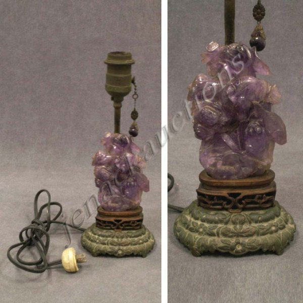 CHINESE CARVED AMETHYST GROUPING LAMP: CHINESE CARVED AMETHYST GROUPING, FISH MOUNTED ON TEAK STAND CONVERTED TO A LAMP. HEIGHT 7"
