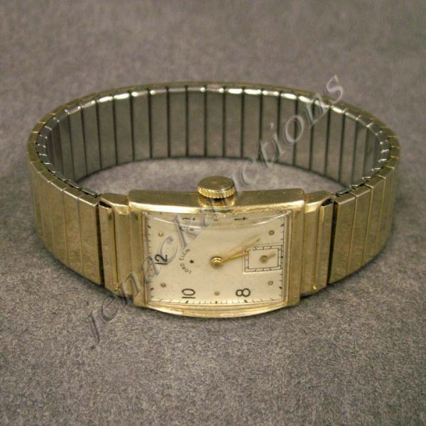 14K LORD ELGIN 21-JEWEL MECHANICAL WRISTWATCH: 14K YELLOW GOLD LORD ELGIN 21-JEWEL MECHANICAL WRISTWATCH ENGRAVED WITH SPIDEL BAND, DATED 1948