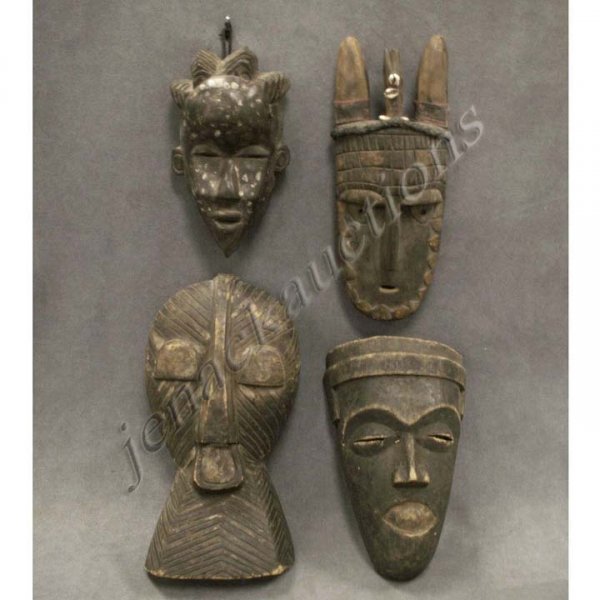 LOT (4) ASSORTED LIBERIAN MASKS INCLUDING DAN: LOT (4) ASSORTED LIBERIAN MASKS INCLUDING DAN, BETE, SONGYE, AND PENDE. HEIGHT 20" LARGEST EX: DAN COLLIER, AFRICANIST AND FOREIGN AREA SPECIALIST, 1963-1965 (WITH WEAR AND ABRASIONS)