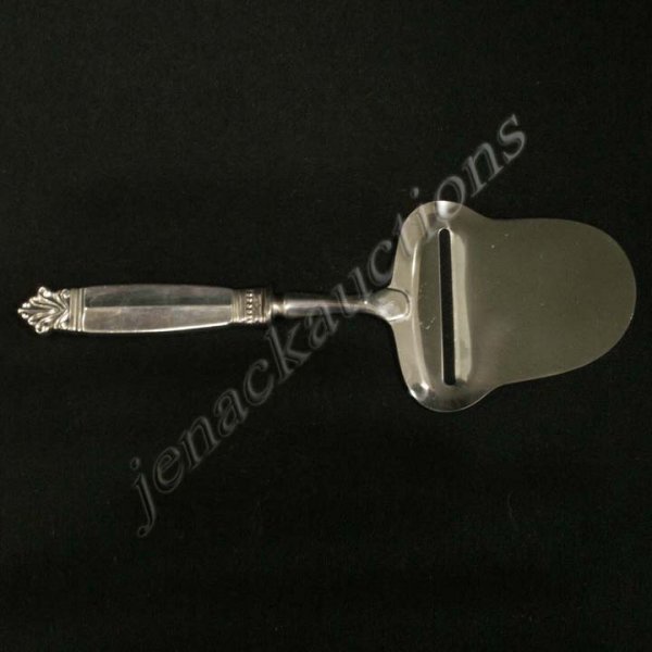 GEORG JENSEN "ACANTHUS" CHEESE SLICE: GEORG JENSEN "ACANTHUS" STERLING HANDLED CHEESE SLICE WITH ORIGINAL GIFT BOX. LENGTH 8 1/4"