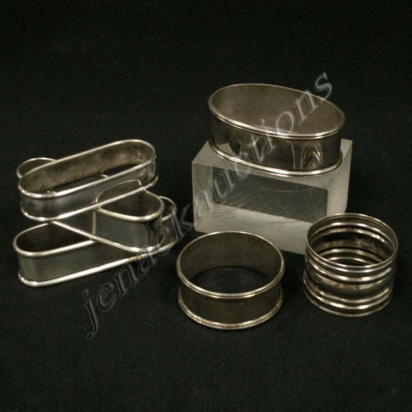 LOT (6) ASSORTED STERLING SILVER NAPKIN RINGS : LOT (6) ASSORTED STERLING SILVER NAPKIN RINGS . TWT 3.08 OZT (3/MONOGRAMMED)