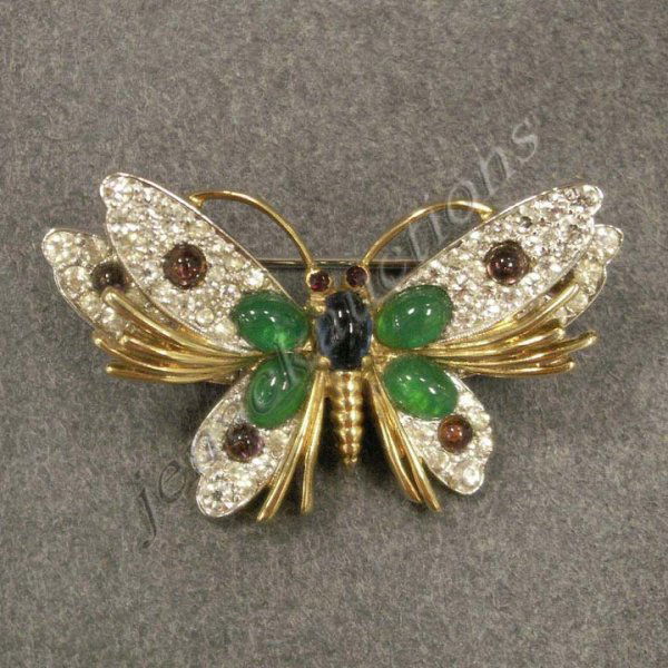 JOMAZ RHINESTONE & PASTE SET BUTTERFLY BROOCH: JOMAZ RHINESTONE & COLORED PASTE SET BUTTERFLY BROOCH, SIGNED. 1 1/4 X 2"