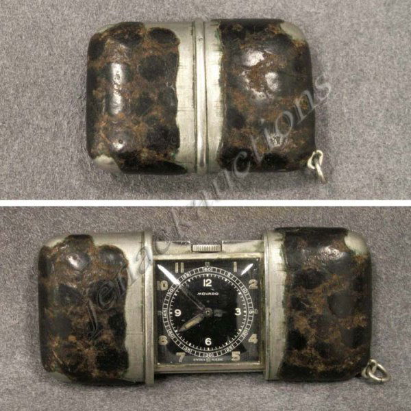 VINTAGE MOVADO PURSE/GOLF WATCH: VINTAGE MOVADO PURSE/GOLF WATCH. CLOSED 2 X 1 1/2" (LEATHER WORN)