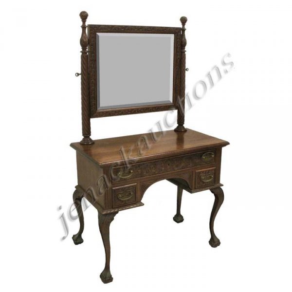 HERTER BROS (ATTRIBUTED) MAHOGANY DRESSING TABLE: HERTER BROS (ATTRIBUTED) CARVED MAHOGANY DRESSING TABLE WITH BEVELED MIRROR. HEIGHT 65"; WIDTH 38"