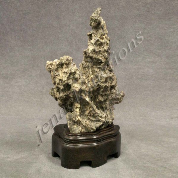 CHINESE CARVED STONE SCHOLAR'S ROCK WITH STAND: CHINESE CARVED STONE SCHOLAR'S ROCK WITH STAND. HEIGHT 9 3/4"