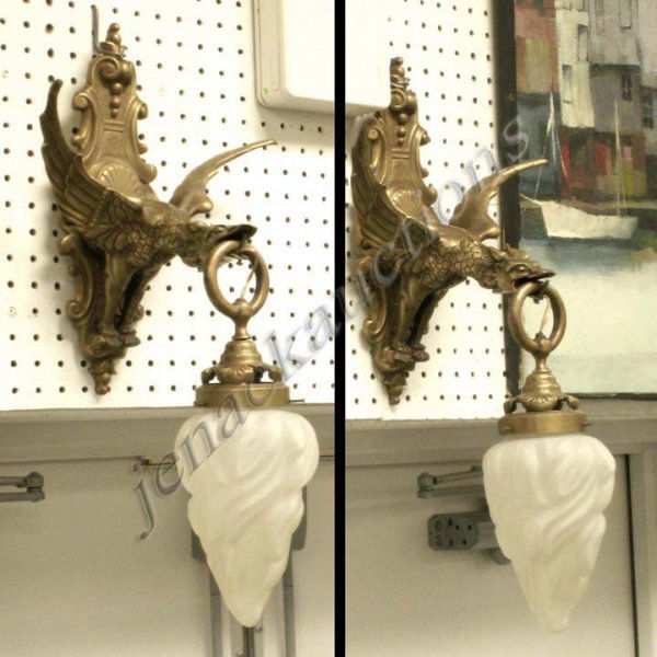 PAIR BRASS DRAGON WALL SCONCES: PAIR BRASS DRAGON WALL SCONCES WITH FROSTED FLAME SHADES. HEIGHT 24"