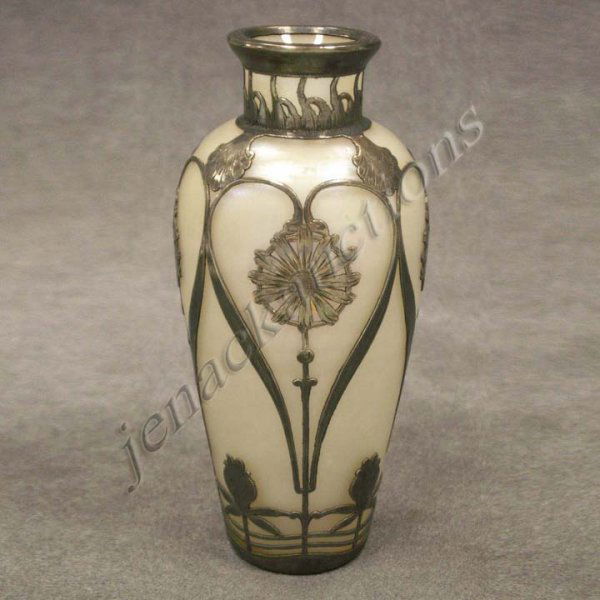AUSTRIAN ART NOUVEAU SILVER OVERLAY VASE: AUSTRIAN ART NOUVEAU SILVER OVERLAY IRIDESCENT CABINET ART GLASS VASE WITH ORIGINAL LABEL: EUGEN MARCUS, BERLIN. HEIGHT 5"(MINOR DENT AROUND TOP LIP EDGE)