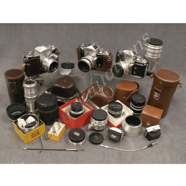 EXAKTA 35MM SLR CAMERA OUTFIT INCLUDING VX BODY: EXAKTA 35MM SLR CAMERA OUTFIT INCLUDING VX BODY WITH SCHNEIDER F1.9 50MM LENS, VAREX VX BODY WITH JENA F2.8 50MM LENS, VAREX IIA BODY WITH ZEISS F2.0 58MM LENS, ZEISS-JENA 1:4 F13.5CM LENS/CASE, STEIN
