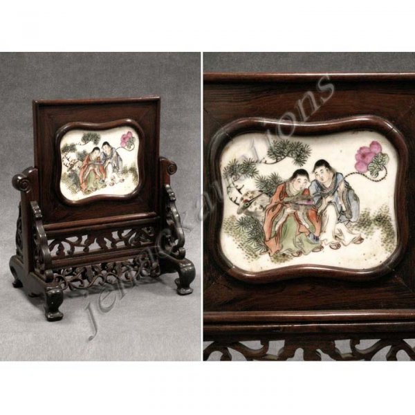 CHINESE HONG MU CARVED TABLE SCREEN: CHINESE HONG MU CARVED TABLE SCREEN WITH INSET PORCELAIN PLAQUE. HEIGHT 11 1/2"; WIDTH 9 1/2"