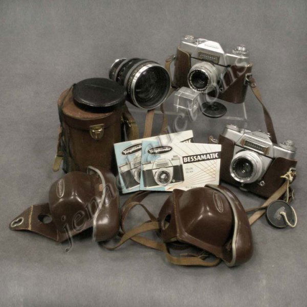 VOIGTLANDER BESSAMATIC 35MM SLR CAMERA OUTFIT: VOIGTLANDER BESSAMATIC 35MM SLR CAMERA OUTFIT INCLUDING (2) BODIES WITH ZKOPAR F2.8 50MM 2.8 LENSES; ZOOMAR F2.8 36-82MM LENS (WORLD'S FIRST SLR ZOOM LENS) WITH CASES/LITERATURE