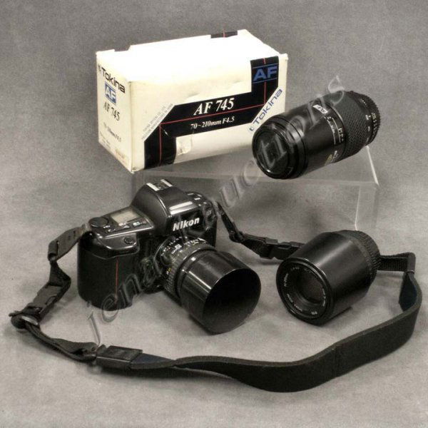 LOT (3) INCLUDING NIKON N90S CAMERA BODY: LOT (3) INCLUDING NIKON N90S CAMERA BODY WITH NIKKOR AF F1.8 50MM LENS/HOOD; TOKINA AF F4.5 70-210MM LENS WITH BOX; SIGMA AF UC-II F4-5.6 70-210 MM LENS WITH HOOD