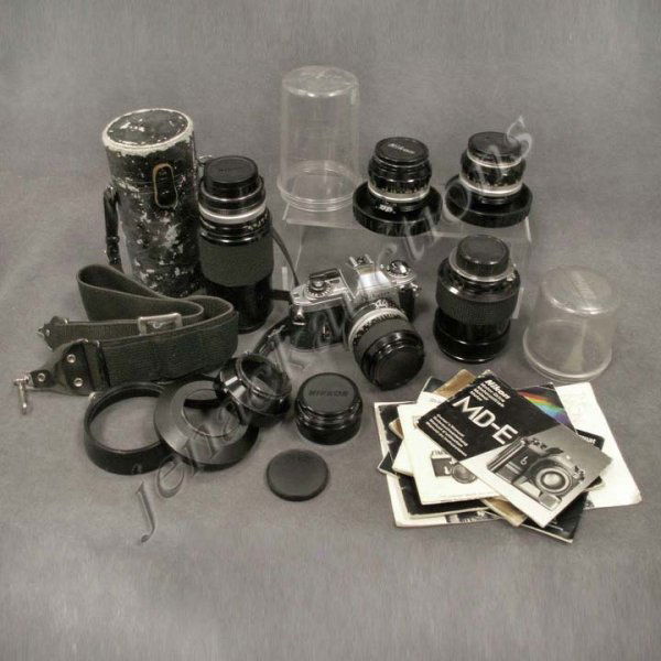 NIKON 35MM SLR CAMERA OUTFIT: NIKON 35MM SLR CAMERA OUTFIT INCLUDING NIKON FG BODY WITH NIKKOR-P F:3.5 55MM LENS; NIKKOR AUTO ZOOM F4.5 80-200MM LENS/CASE; NIKKOR N F2.8 24MM LENS/CASE; NIKKOR S F1.4 50MM LENS/CASE; VIVITAR SERIES