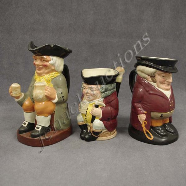 LOT (3) ROYAL DOULTON PORCELAIN TOBY JUGS: LOT (3) ROYAL DOULTON PORCELAIN TOBY JUGS INCLUDING JOLLY TOBY, HEIGHT 6 1/4"; THE HUNTSMAN, HEIGHT 8"; HAPPY JOHN, HEIGHT 9"