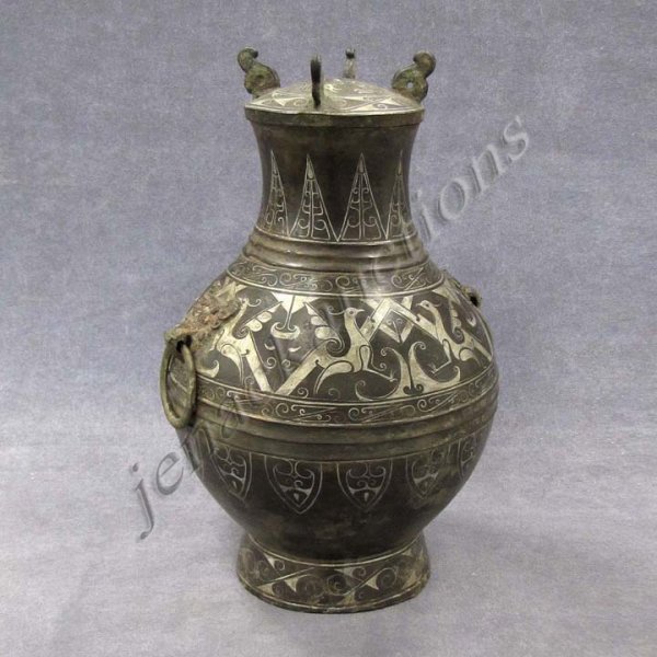 CHINESE BRONZE DECORATED WINE VESSEL