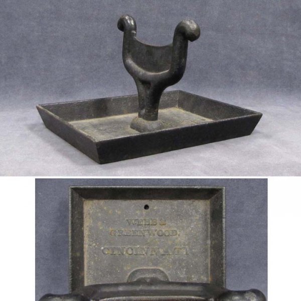 CAST IRON WEBB & GREENWOOD, CINCINNATI, OHIO : CAST IRON WEBB & GREENWOOD, CINCINNATI, OHIO BOOT SCRAPE WITH ATTACHED PAN, 19TH CENTURY. HEIGHT 9"; LENGTH 13"