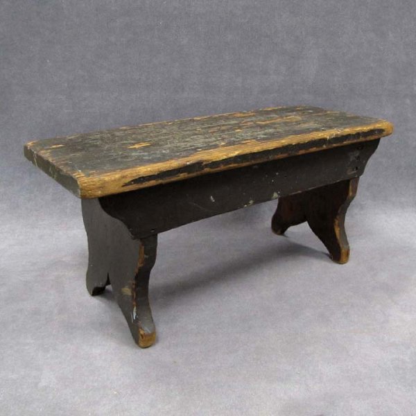 PAINTED PINE CRICKET STOOL WITH BOOT JACK ENDS: PAINTED PINE CRICKET STOOL WITH BOOT JACK ENDS, ATTRIBUTED TO SHAKER WORKSHOPS, 19TH CENTURY. HEIGHT 8" LENGTH 17"