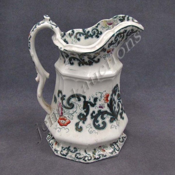 VICTORIAN DECORATED IRON STONE PITCHER: VICTORIAN DECORATED IRON STONE PITCHER WITH "SCROLL" PATTERN, 19TH CENTURY. HEIGHT 8 1/2"
