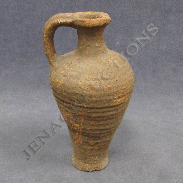 ROMAN PERIOD POTTERY WHEEL MADE JUG/AMPHORA: ROMAN PERIOD POTTERY WHEEL MADE JUG/AMPHORA, C.300-500 AD. HEIGHT 8" EX: COLLECTION MOSHE DAYAN WITH PROVENANCE.