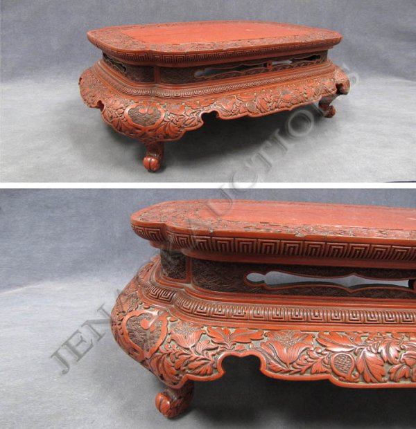 CHINESE CARVED CINNABAR STAND: CHINESE CARVED CINNABAR STAND. HEIGHT 7 1/4"; TOP 12 3/4 X 19 1/4" (SPLIT TOP)