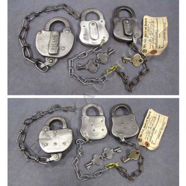 LOT (3) INCLUDING (2) UNMARKED YALE JUNIOR GUITAR: LOT (3) INCLUDING (2) UNMARKED YALE JUNIOR GUITAR SHAPED UTILITY LOCKS, BOTH WITH KEYS, 1/KEY WITH TAG-"KEY TO SHANTY AT LITTLE FALLS TRESTLE UNDER BRIDGE" AND NY O & W RR ADLAKE STEEL SWITCH LOCK