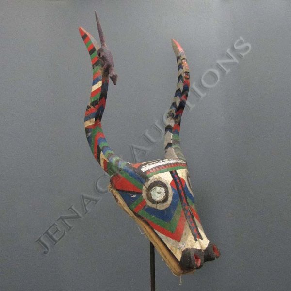 BOZO MALI CARVED & PAINTED ANIMAL MASK: BOZO MALI CARVED & PAINTED ANIMAL MASK. HEIGHT 48" WITH STAND
