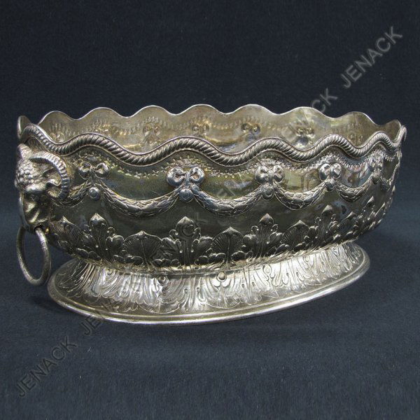 CHARLES STUART HARRIS LONDON STERLING OVAL MONTEIT: CHARLES STUART HARRIS LONDON STERLING OVAL MONTEITH WITH RINGED RAMS HEAD MOUNTS, C.1868-9. HEIGHT 4 1/2"; LENGTH 12"; 34.65 OZT