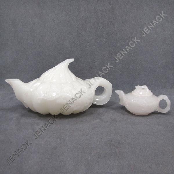 LOT (2) CHINESE CARVED SOAPSTONE TEA POTS: LOT (2) CHINESE CARVED SOAPSTONE TEA POTS. HEIGHT 3 1/2"-6" (OLD REPAIRS)