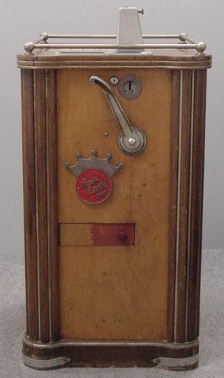 PACE'S REELS 25 CENT CONSOLE SLOT MACHINE: PACE'S REELS 25 CENT CONSOLE SLOT MACHINE, C.1940. (CRACK IN TOP GLASS, SCRATCHES TO CABINET) **DUE TO THE SIZE AND/OR FRAGILITY OF THIS LOT, STANDARD IN-HOUSE SHIPPING IS NOT AVAILABLE. PLEASE CONTAC