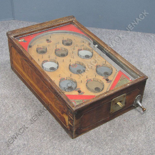 VINTAGE 5-CENT TABLE TOP PINBALL GAME: VINTAGE 5-CENT TABLE TOP PINBALL GAME WITH WOOD CASE, C.1930'S. HEIGHT 9"; LENGTH 24"; WIDTH 16" (MISSING COIN DOOR, BALLS)