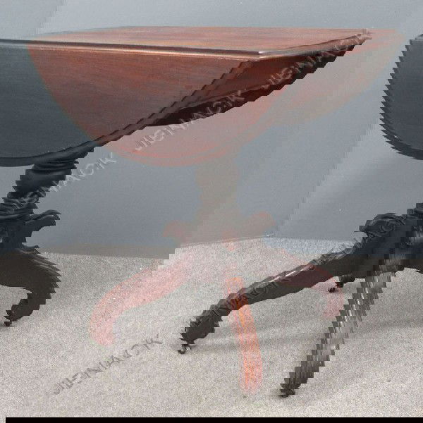 VICTORIAN WALNUT DROP-LEAF CENTER TABLE: VICTORIAN WALNUT DROP-LEAF CENTER TABLE. HEIGHT 31"; DIAMETER 36"