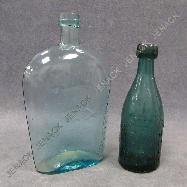 LOT (2) VINTAGE BOTTLES INCLUDING PITTSBURGH UNION: LOT (2) VINTAGE BOTTLES INCLUDING PITTSBURGH UNION/CLASP HANDS AQUA FLASK, C.1860, HEIGHT 9"; UNION GLASS WORKS "CRYSTAL PALACE" SODA WATER BOTTLE, HEIGHT 7 1/2"