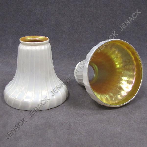 PAIR CALCITE OVER AURENE ART GLASS SHADE: PAIR CALCITE OVER AURENE ART GLASS SHADE, ATTRIBUTED TO STEUBEN. HEIGHT 5"; COLLAR 2 1/4"