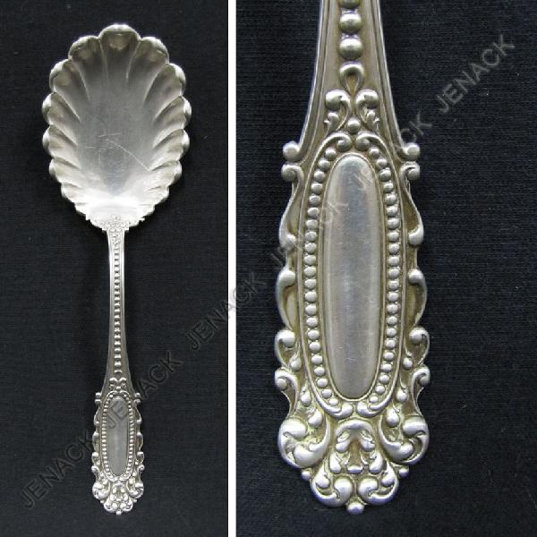 WATSON "EUGENIE" STERLING SILVER BERRY SPOON: WATSON "EUGENIE" STERLING SILVER BERRY SPOON WITH SCALLOPED EDGE BOWL. LENGTH 7 3/4"; 2 OZT
