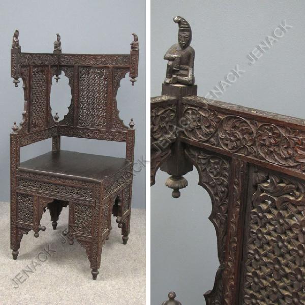 ANGLO INDIAN CARVED TEAK CORNER CHAIR: ANGLO INDIAN CARVED TEAK CORNER CHAIR, 19TH CENTURY. HEIGHT 42"