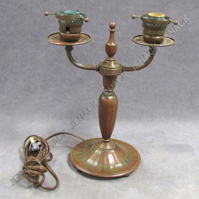 TIFFANY STUDIO PATINATED BRONZE 2-ARM CANDELABRA: TIFFANY STUDIO PATINATED BRONZE 2-ARM CANDELABRA LAMP, SIGNED #A4422. HEIGHT 13"