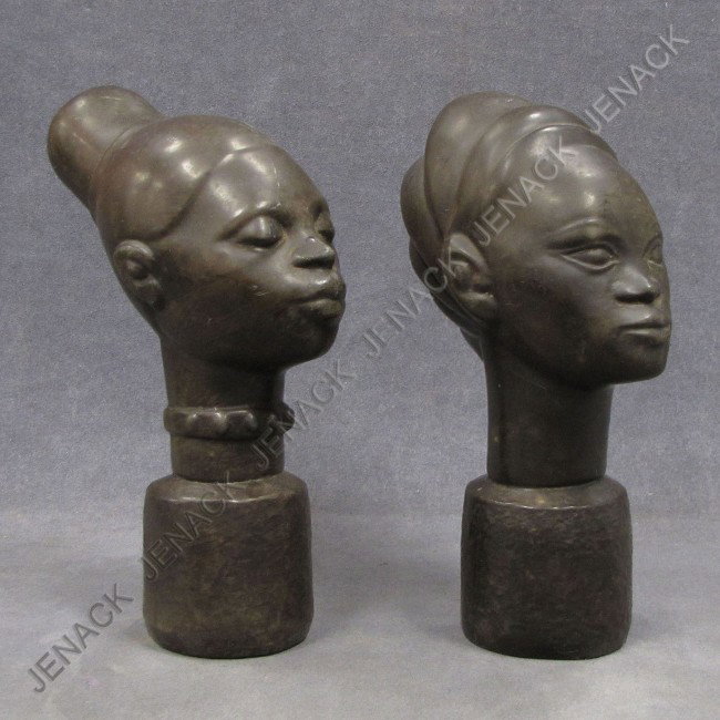 PAIR YORUBA CARVED LIGNUM VITAE HEADS: PAIR YORUBA CARVED LIGNUM VITAE HEADS. HEIGHT 9 1/2"