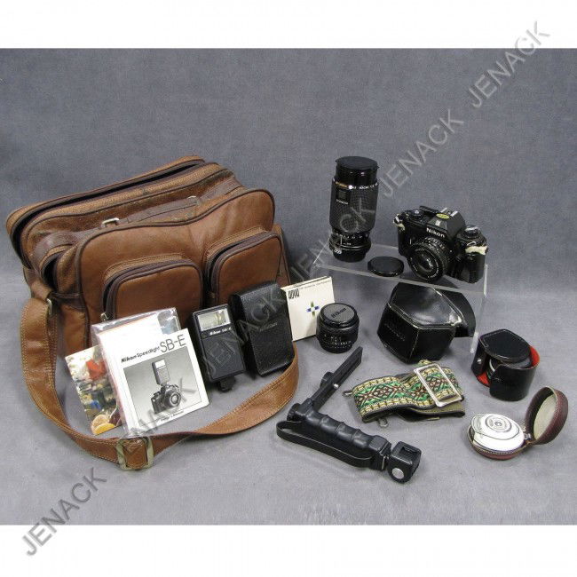 NIKON EM BLACK 35MM BODY WITH NIKON 50MM F 1.8: NIKON EM BLACK 35MM BODY WITH NIKON 50MM F 1.8 LENS; NIKON 34MM F 2.5 LENS; KIRON 80-200MM F 4.5 MACRO ZOOM LENS; STAR-D AUTO TELECONVERTER 2X; FLASH, METER, FITTERS, PAPERS, BAG