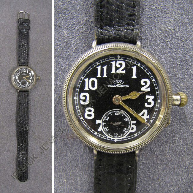 VINTAGE I.W.C. SCHAFFHAUSEN MILITARY WRISTWATCH: VINTAGE I.W.C. SCHAFFHAUSEN STEEL MILITARY WRISTWATCH WITH BUTTON SET, 34MM