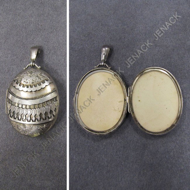 VICTORIAN BIRMINGHAM STERLING LOCKET: VICTORIAN BIRMINGHAM STERLING LOCKET. 1 3/4 X 1 1/2"; GW 0.61 OZT
