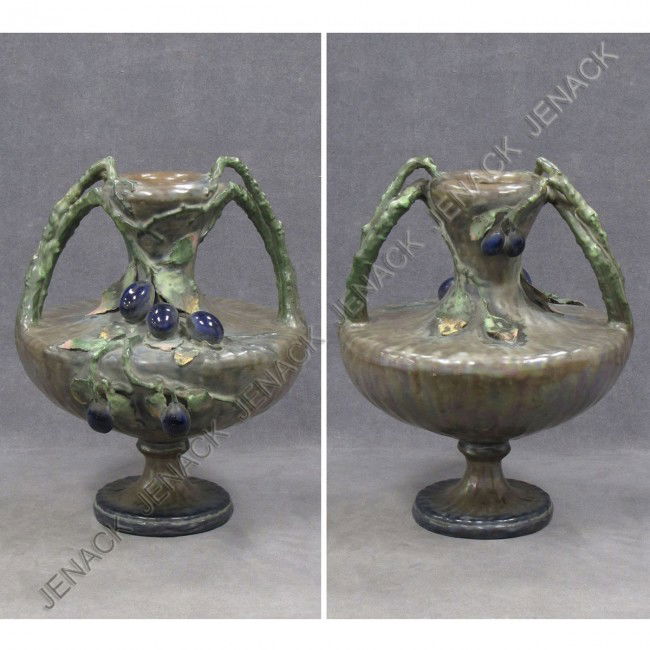 AMPHORA ART POTTERY DOUBLE HANDLE URN: AMPHORA ART POTTERY DOUBLE HANDLE URN. HEIGHT 13 1/2" (CRACK)