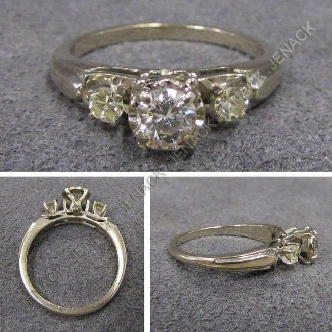 14K WHITE GOLD AND 0.25 CT DIAMOND ENGAGEMENT RING: 14K WHITE GOLD AND 0.25 CT DIAMOND ENGAGEMENT RING WITH (2) 2.77 MM SIDE STONES. RING SIZE 6 1/2