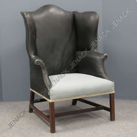 CHIPPENDALE CARVED MAHOGANY WING-BACK ARMCHAIR: CHIPPENDALE CARVED MAHOGANY WING-BACK ARMCHAIR, C.1810