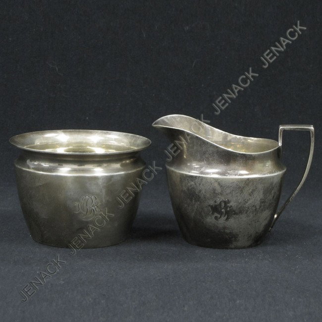 PAIR TIFFANY & CO. MAKERS STERLING CREAMER/SUGAR: PAIR TIFFANY & CO. MAKERS STERLING CREAMER AND SUGAR, MONOGRAMMED #22350, MOORE MARK WITH STAR. HEIGHT 2 1/4" & 2 7/8". TWT 8.68 OZT