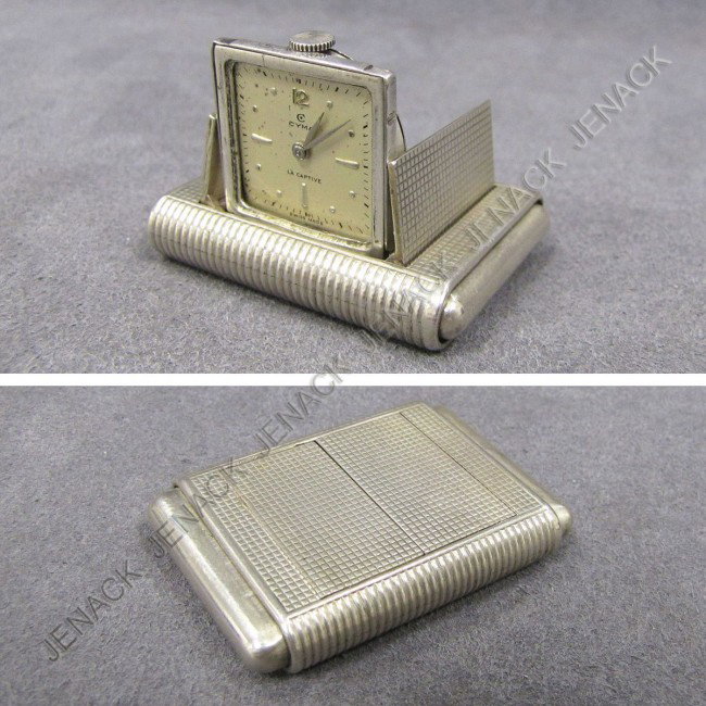 CYMA STERLING SILVER CASED ôLA CAPTIVEö WATCH: VINTAGE CYMA STERLING SILVER CASED AND 17-JEWEL "LA CAPTIVE" #14196 FOLDING WATCH (MISSING CRYSTAL)