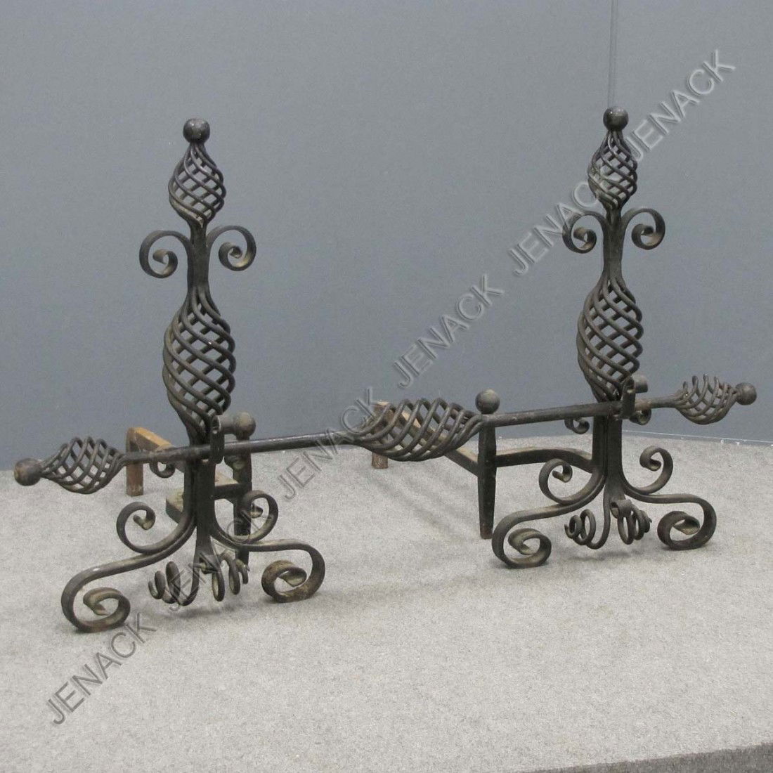 PAIR RENAISSANCE STYLE WROUGHT IRON ANDIRONS: PAIR RENAISSANCE STYLE WROUGHT IRON OPEN BASKET WORK, ANDIRONS. HEIGHT 28"