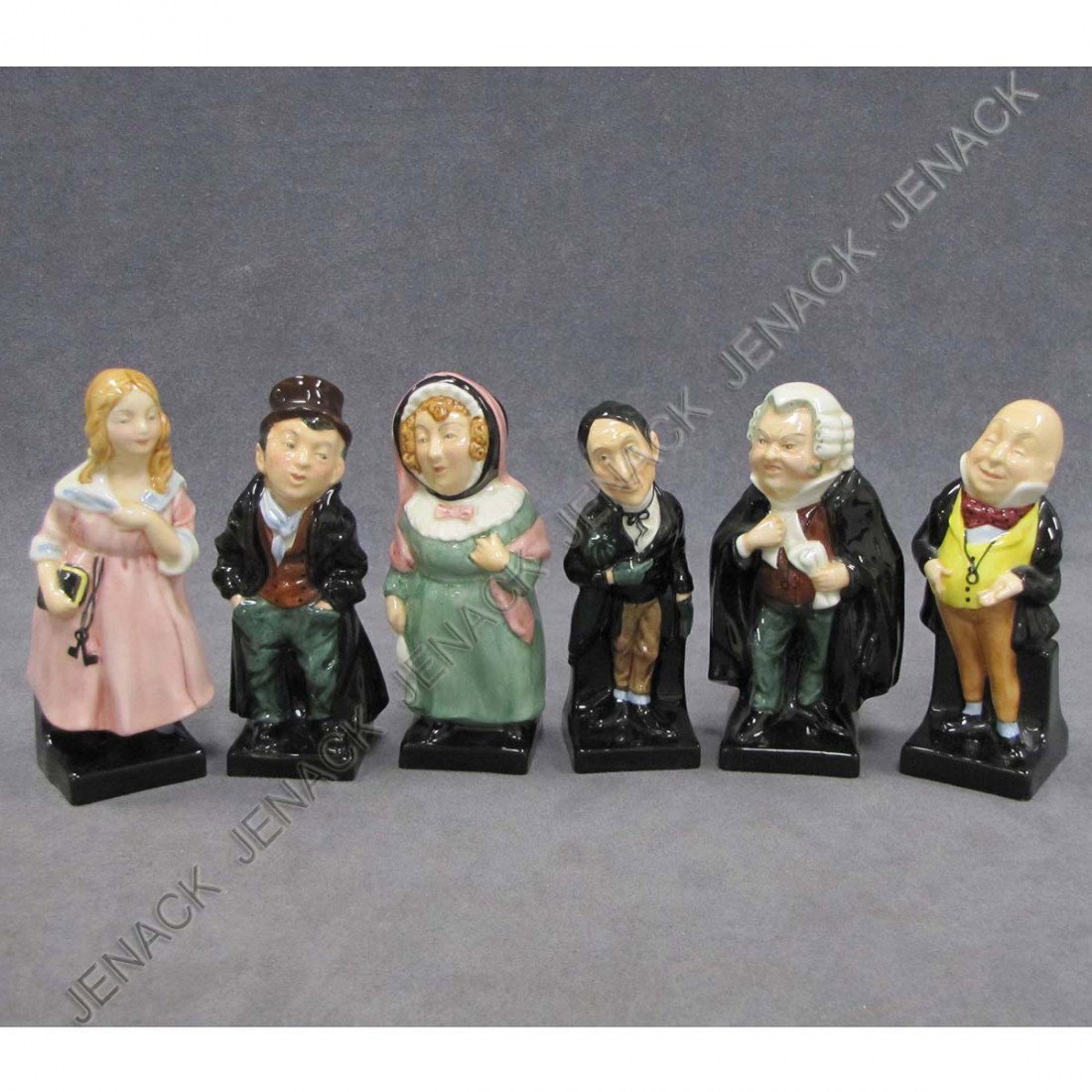 LOT (6) ROYAL DOULTON PORCELAIN DICKEN'S FIGURINES: LOT (6) ROYAL DOULTON PORCELAIN DICKEN'S FIGURINES INCLUDING MICAWBER, ARTFUL DODGER, BUZFUZ, STAGGINS, LITTLE NELL, MRS. BARDELL. HEIGHT 4 1/4"