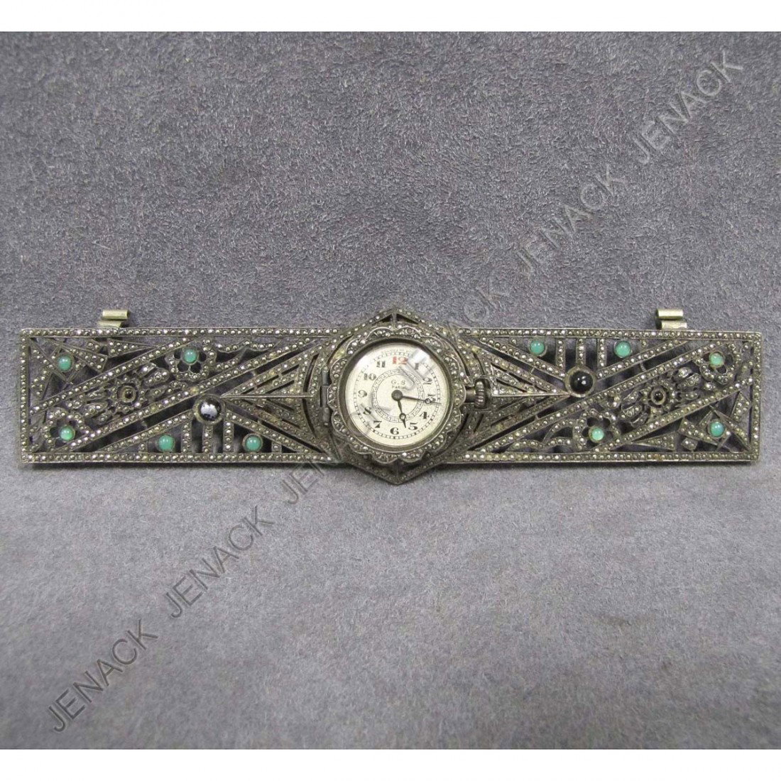 VINTAGE G.S. PARIS SILVER, 10-JEWEL WATCH PLAQUE: VINTAGE G.S. PARIS SILVER, 10-JEWEL WATCH MOUNTED IN ART DECO MARCASITE MOUNTED PLAQUE (POSSIBLY HANDBAG FRAME). 1 X 5 7/8"